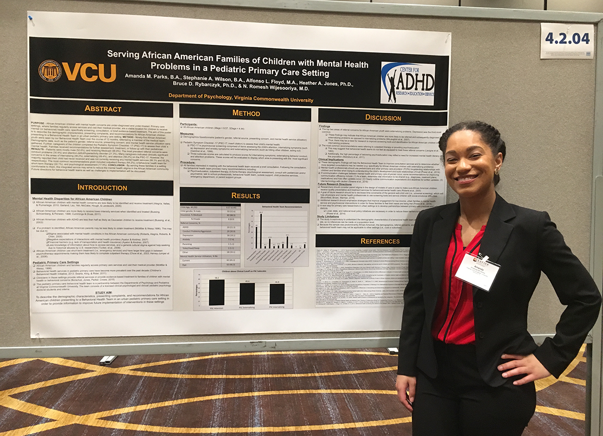 Amanda Parks at the 2017 XULA Diversity Conference standing in front of her research poster, which is titled 